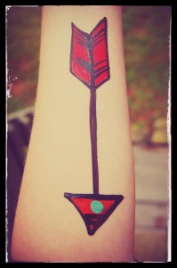 How to face paint a cool and quick arrow tattoo!